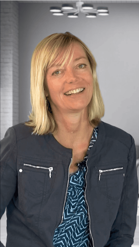 Professional woman speaking at Colorado Precision Medicine event.